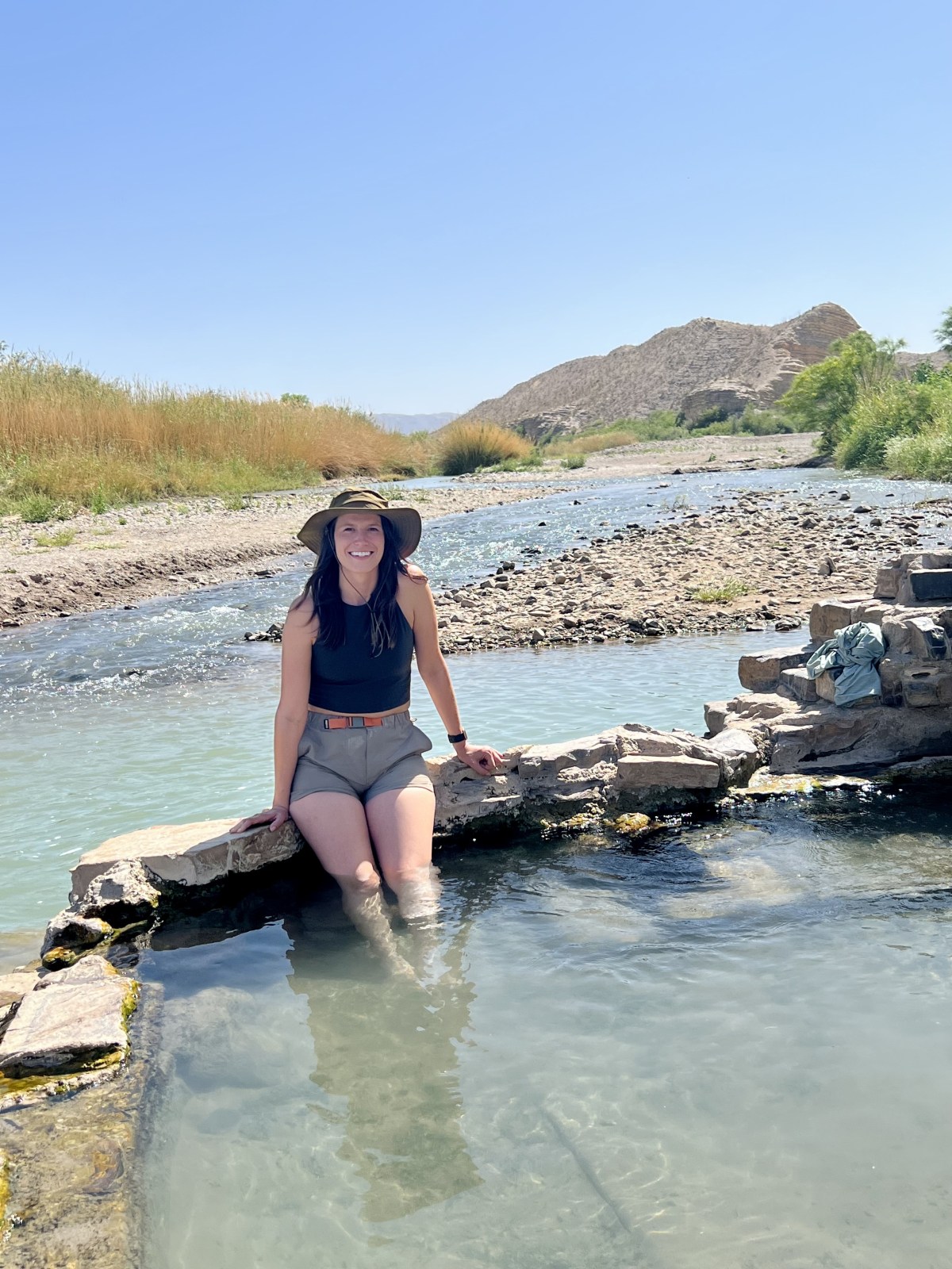 Lauren wearing REI Co-op Trailmade Amphib Shorts​ shorts