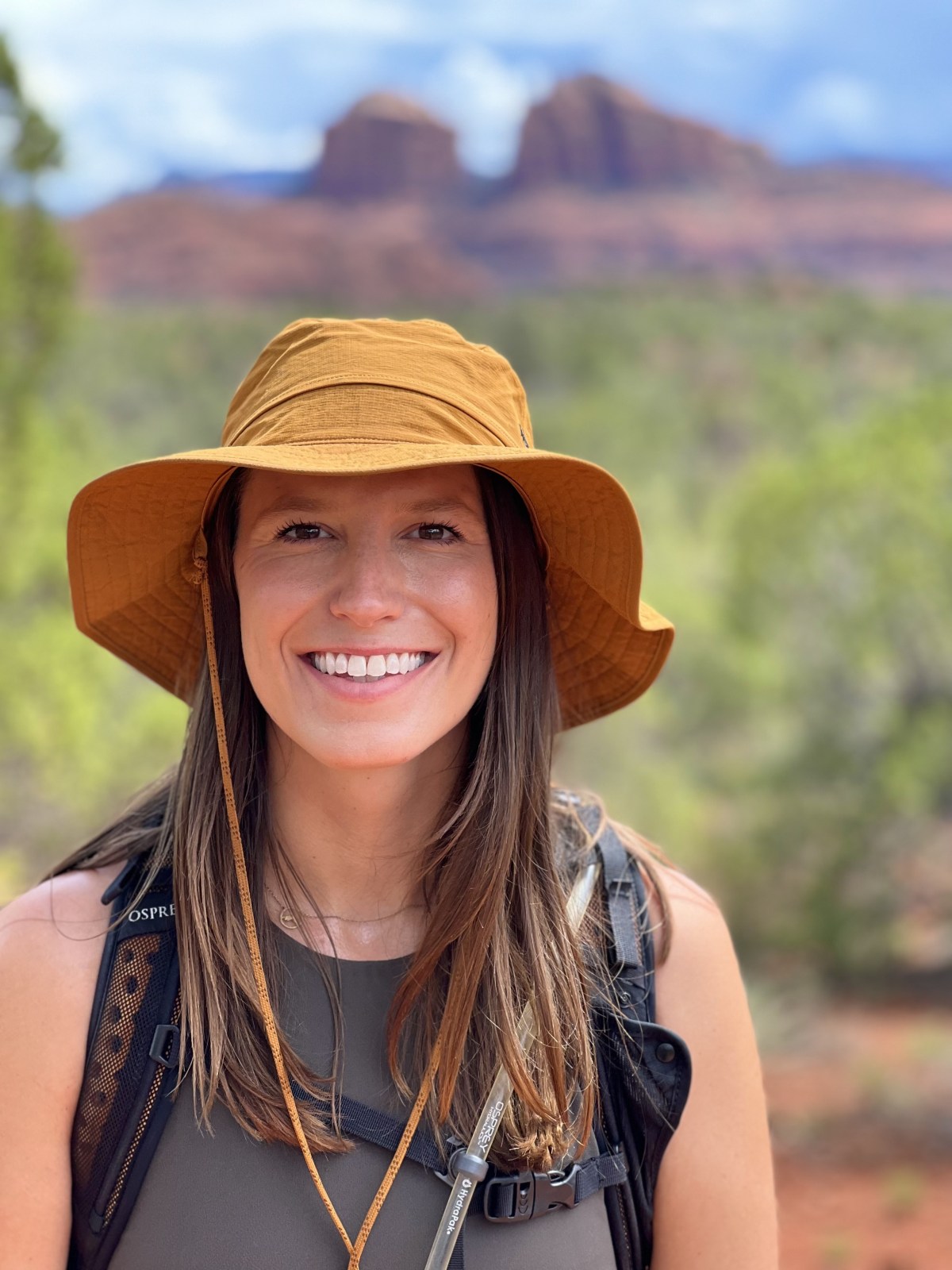 Lauren wearing a summer hiking hat