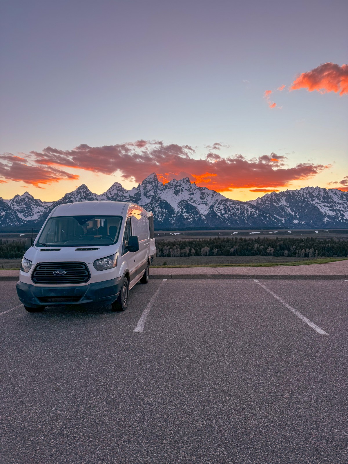 Arizona Camper Van at sunset over the Teton Mountain Range